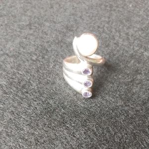 Mother of Pearl and Three Purple Stones